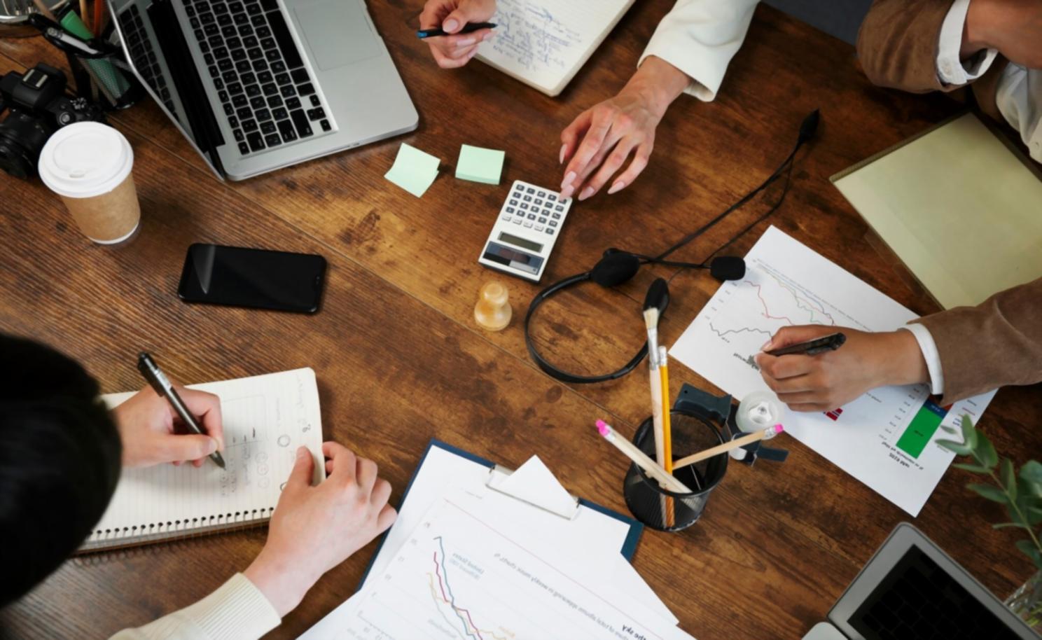 Finance team reviewing budget documents